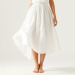 chaussures porter avec une jupe blanche